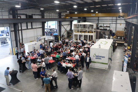 group of people networking at company facility